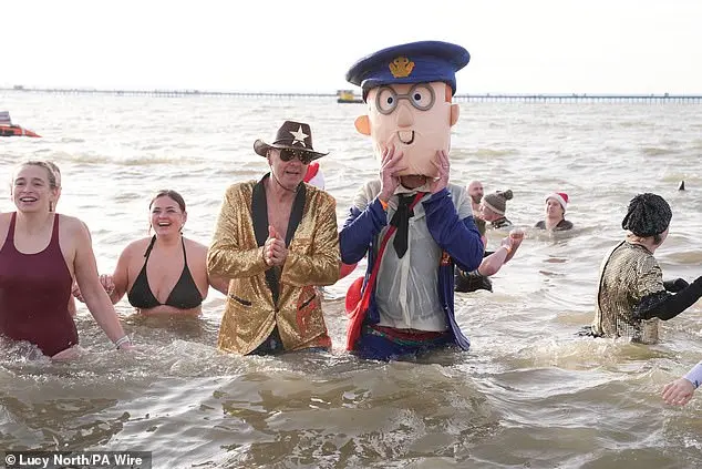 Over 200 swimmers participate in Whitley Bay's traditional New Year's Day dip to mark 2026