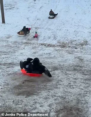 Oklahoma Police Officer's Accidental Sled Collision with Child Goes Viral, No Injuries Reported