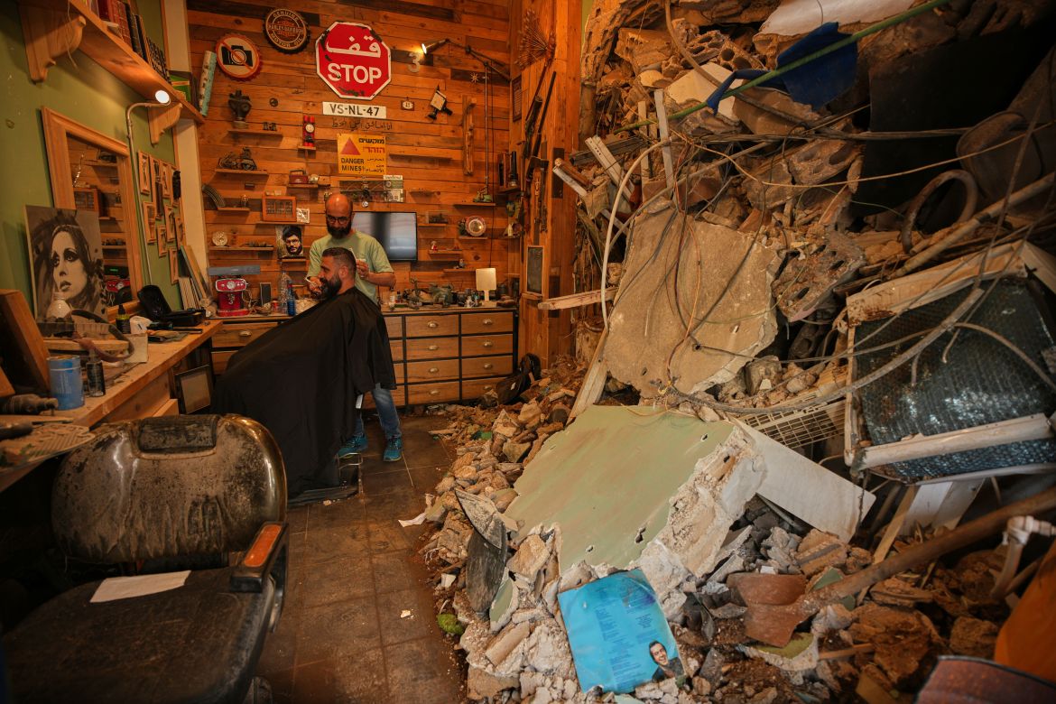 Displaced Lebanese families return south amid truce tensions and active shelling.