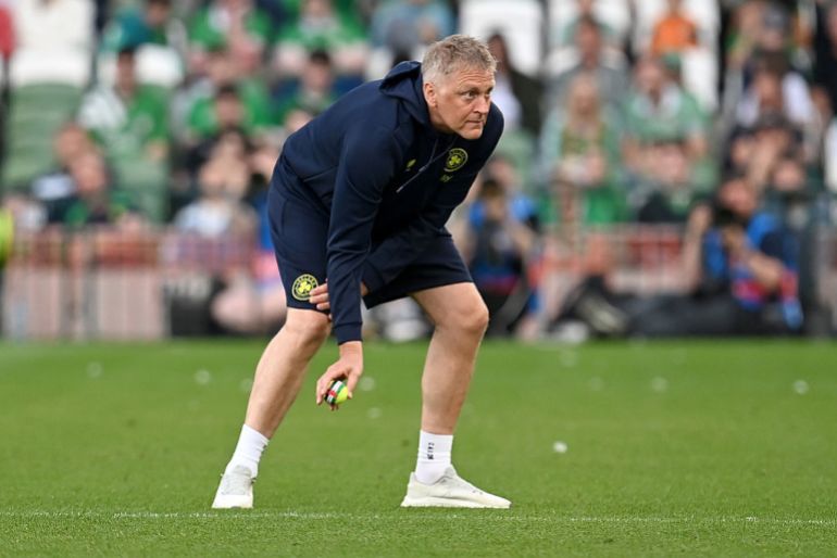 Irish fans protest Israel matches with tennis balls and flag displays.